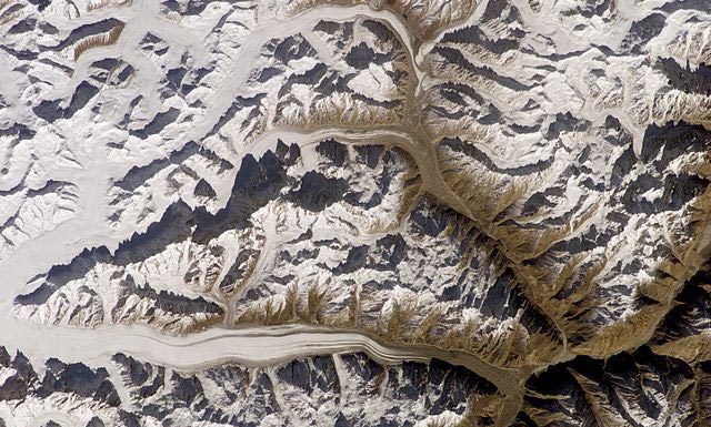 Livingstone, Cesen and Strazar Make First Ascent Of North Ridge Of Latok I In Karakoram Range In Pakistan (UPDATED) By Nasa - http://eol.jsc.nasa.gov/scripts/sseop/photo.pl?mission=ISS014&roll=E&frame=6854, Public Domain, Link